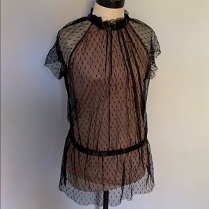 Nude and black mesh top